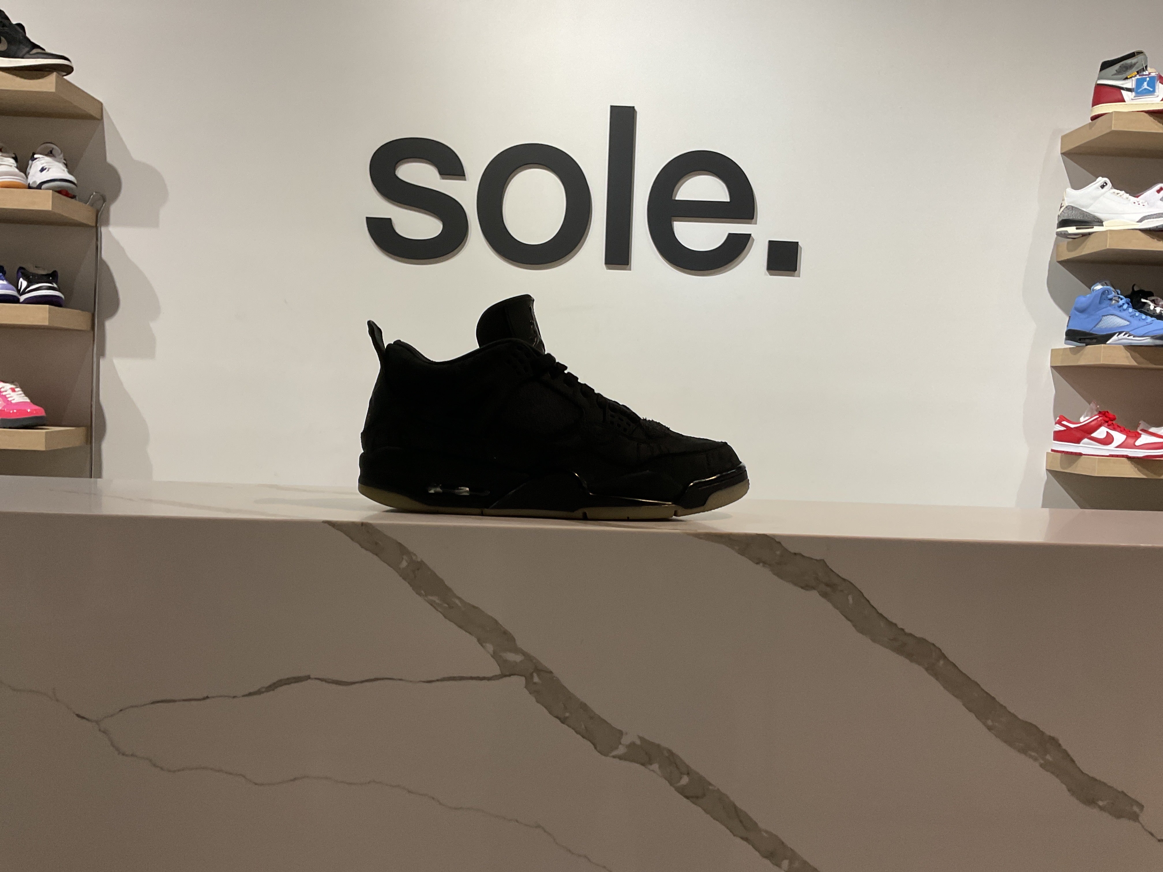 Pre-Owned KAWS x Air Jordan 4 Retro 'Black'